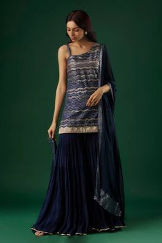 Blue one shoulder kurta with sequin embellished chevron motifs. Comes with tiered sharara and dupatta. - Aza Fashions Blue Georgette Palazzo Set With Self Design, Blue Anarkali Sleeveless Set, Blue Sleeveless Kurta For Festive Occasions, Blue Sleeveless Anarkali Set, Festive Sleeveless Blue Kurta, Festive Blue Sleeveless Kurta, Traditional Blue Sleeveless Sharara, Sleeveless Blue Sets For Diwali, Blue Bollywood Style Sleeveless Sharara