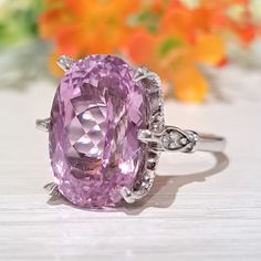 10.50 Carat Natural Kunzite & Diamonds 14k Solid Gold Ring Ring Material: 14k Solid Gold Total Metal Weight: 4.8 Grams Gemstone: Natural Kunzite Gemstone Color: Delicate Light Pink Gemstone Shape: Oval Gemstone Dimensions: 15.00x11.00 mm Gemstone Carat Weight: 10.40 Carat Gemstone Quantity: 1 Diamonds: Natural Round Shaped Diamonds Quantity: 4 Diamonds Total Carat Weight: 0.10 Carat Total Carat Weight: 10.50 Carat Ring Quantity: One Ring Condition: New Made in the USA Delivered in an elegant gif Oval Center Stone Gemstones For Formal Occasions, Gia Certified Oval Collectible Ring, Oval Gia Certified Topaz Ring For Formal Occasions, Formal Oval Topaz Ring Gia Certified, Gia Certified Oval Topaz Ring For Formal Occasions, Exquisite Oval Amethyst Ring With Center Stone, Oval Amethyst Diamond Ring For Anniversary, Oval Topaz Ring With Center Stone For Formal Occasions, Oval Diamond Ring For Collectible