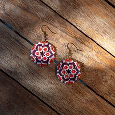 Pair of earrings hand-woven by me with Miyuki beads (Japanese glass beads) and a stainless steel frame Handmade Round Czech Glass Beaded Earrings, Traditional Round Beaded Earrings Gift, Traditional Round Beaded Earrings For Gift, Handmade Red Czech Glass Beaded Earrings, Artisan Red Handmade Beaded Earrings, Handwoven Drop Earrings As Gift, Gift Handwoven Adjustable Beaded Earrings, Handwoven Red Earrings, Traditional Handwoven Earrings For Gifts