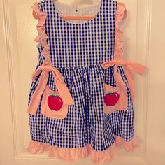 New Boutique Back To School Apple Dress Navy Check With Pink Ruffles And Bows Size 2t (Item Is New Did Not Arrive With Tags When Purchased) Cute Gingham Dresses For School, Cute Gingham School Dress, Kingdom Boutique, Apple Dress, Sewing Aprons, Pink Ruffle, Magic Kingdom, Boutique Dresses, Kids' Dresses