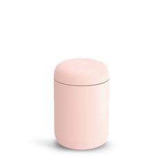 a pink round container on a white background