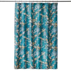 a blue shower curtain with flowers on it