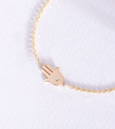 Diamond Hamsa Bracelet 14k 18k Solid Gold, Birthstone Fatima Hand Bracelet, Dainty Diamond Lucky Hamsa Bracelet, Birthday Gift For Her, Gift For Christmas, Good Luck Bracelet  Material: Solid real Gold (not gold filled or gold plated) Gold Karat: 14k (585), 18k (750) Gold Color: Yellow Gold, White Gold, Rose Gold Height of the Hamsa: 11.00 mm Width of the Hamsa: 9.20 mm The size of the hamsa may differ slightly due to handwork. Diamond Color: G-H Diamond Clarity: SI Diamond Weight: 0.03 ct  Brac Adjustable 14k Gold Diamond Bracelet Hand Set, Adjustable Hand Set Diamond Bracelet In 14k Gold, 14k Yellow Gold Diamond Bracelet Gift, 14k White Gold Diamond Bracelet Gift, Gift 14k White Gold Diamond Bracelet, Gift White Gold 14k Diamond Bracelet, White Gold 14k Diamond Bracelet Gift, Gold Gemstone Chain Bracelet In 14k Gold, 14k Gold Chain Bracelet With Birthstone