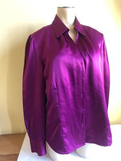 Women's Magenta Size 16  by East 5th  Satiny Button Front Blouse  With Bust Darts,  Princess Seams and tiny side vents for shaping 100% Polyester Made in Indonesia  Machine Wash Warm  This blouse is vintage 1990's but was very well cared for. Classic Fitted Blouse With Button Closure, Formal Solid Color Tops With Buttons, Formal Fitted Blouse With Button Closure, Fitted Blouse With Button Closure, Fitted Party Blouse With Back Button Closure, Fitted Blouse With Back Button Closure For Party, Classic Fitted Top With Snap Buttons, Classic Fitted Tops With Snap Buttons, Purple Button-up Blouse For Formal Occasions