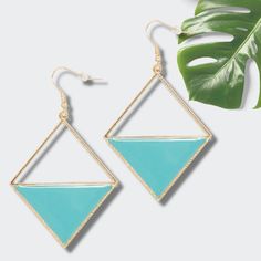 These enamel earrings with easy gold trim are the perfect pop of color to make any outfit Tropic Like it's Hot!!! Available in green, yellow and turquoise. 18 Karat Gold Plated Nickel and Lead Free Designed exclusively for Tate + Zoey by our Gifted Artist, Moon & Lola Available in green, yellow and turquoise