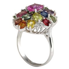 Stamped: 14K White Gold Total Ring Weight: 6.5 Grams Ring Length: N/A Ring Width: N/A Gemstone Weight: Total Natural Center Sapphire Weight is 1.30 Carat (Measures: 8.00x5.90 mm) Color: Pink Gemstone Weight: Total Natural Side Sapphire Weight is 6.03 Carat Quantity: 18 Color: Multicolor Diamond Weight: Total Natural Diamond Weight is 0.30 Carat Quantity: 10 Color: F-G, Clarity: VS2-SI1 Face Measures: 24.80x19.70 mm Sku: [702488W] Elegant Multicolor Ruby Ring, Multicolor Cluster Jewelry For Formal Occasions, Multicolor Oval Diamond Ring For Formal Occasions, Oval Multicolor Multi-stone Rings, Multicolor Ruby Ring For Formal Occasions, Formal Multicolor Oval Diamond Ring, Elegant Multicolor Open Crystal Ring, Multicolor Sapphire Ring With Prong Setting For Formal Occasions, Formal Cluster Ring With Accent Stones And Open Shape