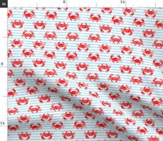 red crabs on blue and white striped fabric