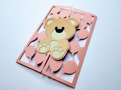 a card with a teddy bear cut out on it's front and back sides