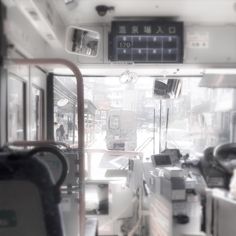 the inside of a bus with lots of electronic devices on it's walls and windows