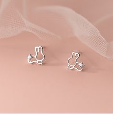 Sterling Silver Cut Out Bunny Rabbit Stud Earrings Rhinestone Tail Adorable Bunny Earrings For Easter Or All Year Round Measures Approx Just Shy Of 5/16 Inch Available In Silver Or Gold Tone-Please Specify Visit My Closet For More Cute Stud Earrings Bundle And Save 15% Mondstadt Characters, Bunny Jewelry, Rabbit Earrings, Cute Stud Earrings, Bunny Earrings, Adorable Bunny, Earring Bundle, Concert Fits, Earrings Studs