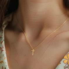 Discover the elegance of simplicity with our Tiny Cross Necklace.  This exquisite piece features a dainty, minimalist gold-plated cross pendant, perfect for adding a touch of grace to any outfit.  Whether you're seeking a thoughtful gift for your girlfriend, a meaningful religious symbol, or a charming accessory for bridesmaids, this gold cross necklace is an ideal choice.  Its delicate design makes it a versatile addition to any jewelry collection, suitable for both everyday wear and special oc Minimalist Yellow Gold Cross Necklace With Clavicle Chain, Minimalist Gold Plated Cross Necklace, Minimalist Rose Gold Cross Necklace, Minimalist Crucifix Cross Necklace With Clavicle Chain, Elegant Cross Necklace With Delicate Chain, Minimalist Cross Necklace With Clavicle Chain, Simple Gold Cross Necklace As A Gift, Minimalist Rose Gold Cross Pendant Necklace, Minimalist Yellow Gold Cross Necklace