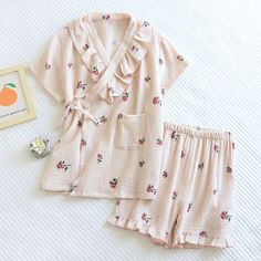 This Two-Piece Set Kawaii Sleepwear﻿ is perfect for chilling and relaxing at your home. Suitable for nighttime looks. It features a button-down notched collar design and a pocket for added functionality. It is made from a premium and durable fabric which is also washing machine friendly. You only need this loungewear to unwind at home. They project adaptability and effortless grace with each stride you take since they are soft and pleasant to the touch. Each of our comfy sets is made to make you Comfortable Sleepwear With Pockets For Sleepover, Cotton Sleepwear With Pockets For Sleepovers, Cotton Sleepwear With Pockets For Relaxation, Cute Relaxed Fit Sleep Sets, Cute Relaxed Fit Sleepwear Sets, Kawaii Cotton Sleepwear For Summer, Pink Sets For Relaxation In Summer, Pink Relaxation Sets For Summer, Pink Summer Relaxation Sets