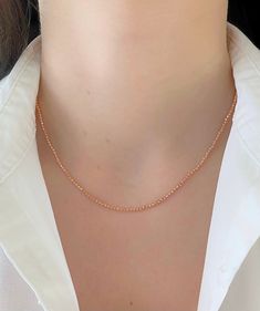 "Shiny And Bright Dainty 14K Rose Gold Beaded Ball Solid Chain. Perfectly Worn Alone Or Layered. Necklace Is Perfect For Any Occasion. A Beautiful Gift She Will Treasure Forever! Jewelry Comes In A Cute Jewelry Box Ready To Present. Model Is Wearing 16\" Chain -All Jewelry Is New And Inspected For Quality Assurance. -Jewelry Is Crafted In Genuine High Quality 14K Gold. -We Do Not Sell Gold Plated Or Gold Filled. Product Detail: Metal: 14k rose gold Weight: 16\" inch 5.2 grams Width: 2mm Closure: Rose Gold Single Strand Necklace As Gift, Rose Gold Single Strand Necklace For Gift, Rose Gold Beaded Chain Necklace For Gift, Delicate Single Strand Rose Gold Necklace, Rose Gold Necklaces With Round Tiny Beads, Rose Gold Ball Chain Necklace As Gift, Rose Gold Ball Chain Necklace Gift, Rose Gold Single Strand Necklace With Round Beads, Dainty Rose Gold Beaded Necklace With Round Beads