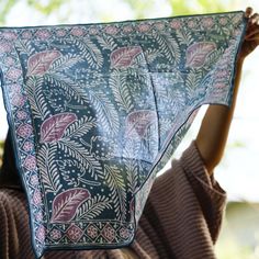 The intricate pattern on our hand-dyed Batik Bandana is crafted by skilled artisans in Indonesia using a 700-year-old batik technique. This bandana is made from white cotton fabric that is then hand-stamped and hand-dyed using 700 years old batik wax and dye technique. The batik fabric is also then sun baked. You should expect some variation of the color. This pattern is called Pakis Pucuk, which translates to Fern Fantasy, in Pink and Blue color. Size: approximately 20”x20”. Due to the pre-wash Bohemian Indigo Batik Print Dupatta, Bohemian Indigo Cotton Dupatta, Bohemian Indigo Dupatta With Batik Print, Indigo Cotton Dupatta With Block Print, Blue Cotton Dupatta With Batik Print, Traditional Hand Printed Cotton Dupatta, Bohemian Cotton Dupatta With Batik Print, Bohemian Cotton Dupatta With Hand Print, Bohemian Cotton Dupatta Hand Printed