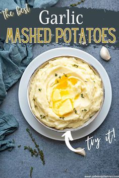 garlic mashed potatoes on a plate with an egg in the middle and text overlay