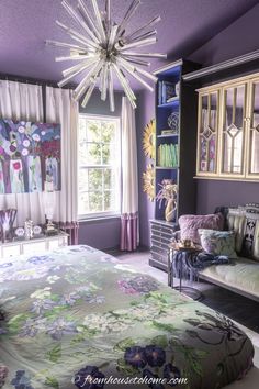 A sputnik light fixture above a bed in a dark purple bedroom Purple Bedroom Design, Bedroom Purple, Bedroom Colour Palette, Trending Paint Colors