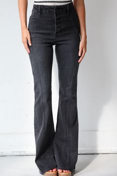 Elevate your denim game with the Zoey Black Flare Jeans, a perfect fusion of sophistication and retro flair! Designed to flatter and enhance your silhouette, these jeans are a chic and versatile addition to any wardrobe. Crafted from high-quality, stretchy black denim, these jeans feature a high-rise waist that provides a flattering fit while elongating your legs. The sleek black hue offers a streamlined and polished look, making these jeans easy to dress up or down for any occasion. The flare l Flare Jeans Outfit Aesthetic, Trendy Jeans For Women, Black Flared Jeans, Sweaters Trendy, Flare Jeans Outfit, Black Flare Jeans, Flair Jeans, Denim Fashion Women, Trendy Jeans