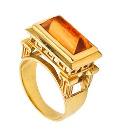 Architectural ring designed by Finestra. Beautiful architectural cocktail ring, created by the goldsmiths and designers of Finestra, back in the 1990. This ring has been inspired by the architecture of the Greeks and Romans temples and crafted in three dimensions in solid yellow gold of 18 karats with textured finish. The ring is embellished on top with a natural earth mined orange citrine with a special cut simulating the pediment and roof of an ancient temple. Citrine: Mount in a bezel setting Modernist 14k Gold Ring For Formal Occasions, Modern Yellow Gold Collectible Rings, Formal Modernist 14k Gold Ring, Modernist Yellow Gold Rings For Formal Occasions, Modernist 14k Gold Formal Ring, Art Deco Gold Topaz Ring Collectible, Gold Art Deco Topaz Ring Collectible, Art Deco Yellow Gold Topaz Ring, Architectural Rings