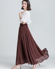 * A long skirt with fixed waist and side zipper. * A-line shape and wide hem, can make you look more taller and slimmer. * Made of pearl chiffon and fully lined. * Can custom make waist size and skirt length. * Material: 100% polyester * Size: True to US size, US 0-US 20 are available, you can let us know your usual size and height in your order. * Shipping: Free shipping Processing time : 5-7 Business days Delivery time : 7-20 Business days Tracking number available If you need rush order or ex Chic A-line Flowy Maxi Dress, Flowy A-line Dress With Lined Skirt, Chic A-line Lined Maxi Skirt, Chic A-line Maxi Skirt With Lining, Chic Solid Color Flowy Maxi Skirt, Chic Solid Flowy Maxi Skirt, Elegant Flowy Skirt With Wide Hem, Elegant Skirt With Wide Hem, Solid Color Flowy Dress With Lined Skirt