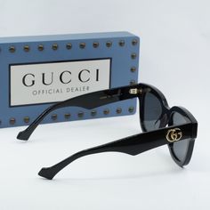 Introducing the stunning Gucci GG0998S 001 Black/Grey sunglasses, a true fashion statement for the modern woman. These stylish shades feature a sleek black acetate frame with a bold square shape, adding a touch of sophistication to any outfit. The grey lenses offer a chic contrast to the black frame, creating a timeless and classic look that is sure to turn heads wherever you go. At OSSA FRAMES, we pride ourselves on offering only the highest quality designer eyewear, and these Gucci sunglasses Gucci Luxury Cat Eye Polarized Sunglasses, Gucci Luxury Cat Eye Sunglasses With Polarized Lenses, Luxury Acetate Cat Eye Sunglasses With Polarized Lenses, Luxury Cat Eye Sunglasses With Polarized Lenses, Gucci Designer Cat Eye Sunglasses With Gradient Lenses, Chic Gucci Cat Eye Sunglasses With Gradient Lenses, Gucci Designer Cat Eye Sunglasses With Uv Protection, Gucci Classic Cat Eye Sunglasses With Uv Protection, Classic Gucci Cat Eye Sunglasses With Uv Protection