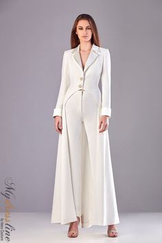 Looking for a chic and unique dress for your next special occasion? Check out the Sara Badr 27341 from the Spring 2021 evening collection. Whether you're attending a black tie event or a family wedding, you'll be sure to turn heads in this stunning dress. Luxury Full-length Bottoms For Wedding, Luxury Silk Evening Pantsuit, Luxury Elegant Wide-leg Pantsuit, Luxury Silk Formal Pantsuit, Elegant Luxury Pants For Wedding Occasions, Luxury Fitted Wide-leg Pantsuit, Luxury Chic Evening Pantsuit, Luxury High-waist Pantsuit For Formal Occasions, Luxury Wedding Pant Set With Traditional Drape