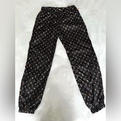 New Like Condition Lv Monogram Jogger Pants From The “Wild At Heart Collection” That Are Currently Sold Out In This Rare Color Combo. Size Eu36 Equivalent To Us4. Worn Very Gently A Handful Of Times, No Visible Signs Of Wear Present. Will Include Dust Bag. Product Details: Regular Fit. Hook Closure, Elasticated Ankles And Waist, And Two Zipped Pockets On The Sides. One Pocket In The Back. Louis Vuitton Pants, Wild At Heart, Lv Monogram, Jogging Pants, Wild Hearts, Color Combo, Jogger Pants, Color Combos, Louis Vuitton Monogram