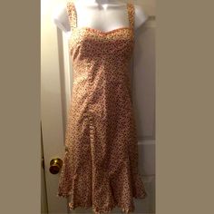 This Is A Stunning Nanette Lepore Dress. It Has A Pink Floral Material, A Lined Bust, Side Zip Closure And The Straps Adjust To Crisscross Or Regular Style. A Stunning Dress. Hits At Or Above The Knee. New Without Tags. Sz: 6 Chest Flat: 15" Waist Flat: 14" Total Length: 27" 97 Cotton 3 Spandex Bin 69 Pink Fitted Knee-length Sundress, Fitted Dress With Ditsy Floral Print And Sweetheart Neckline, Feminine Fitted Cotton Sundress, Fitted Feminine Cotton Sundress, Pink Fitted Sundress With Sweetheart Neckline, Pink Sleeveless Dress With Ditsy Floral Print, Fitted Sundress With Sweetheart Neckline For Daywear, Fitted Pink Cotton Sundress, Fitted Pink Summer Sundress