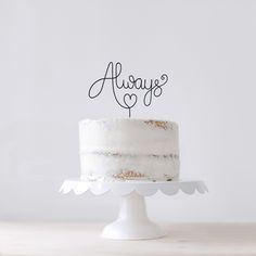 there is a cake with the word always on it and a heart in the middle