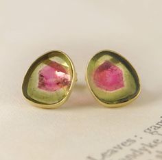 Watermelon Tourmaline Birthstone Gold Earrings - These 4.2 carat Brazilian Watermelon Tourmaline slices feature sublime olive green and pomegranate pink hues, and are encased in subtle 18k gold vermeil settings. #Embersjewellery #Jewellery #Valentine #Valentinesday #PersonalisedGift #ForHer Mosaic Earrings, Pink Watermelon, Watermelon Rind, Stained Glass Jewelry, Fruit Jewelry, Tourmaline Earrings, 18k Gold Earrings, Birthstone Earrings