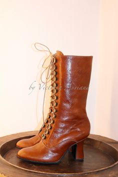 Vintage Vegetable-tanned Leather Boots, Victorian Boots With Leather Sole For Fall, Vintage Lace-up Boots With Pointed Toe And Leather Sole, Victorian Round Toe Boots For Fall, Victorian Style Round Toe Boots For Fall, Victorian Style Fitted Leather Boots, Fitted Victorian Leather Boots, Steampunk Leather Boots With Round Toe, Victorian Boots With Leather Sole And Round Toe