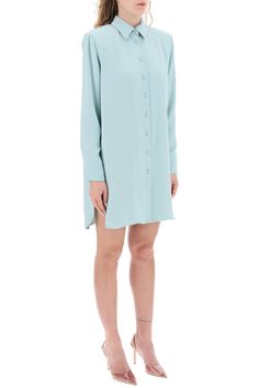 MVP Wardrobe mini shirt dress crafted in technical cady. Design with padded shoulders and back yoke with side pleats featuring pointed collar, front button fastening, long sleeves with double-button cuffs and rounded slits on sides. Relaxed fit with straight cut. The model is 177 cm tall and wears size IT 38. Size Info IT Color Detail Light blue Made In Italy Material 100%PL Season One spring Season Two summer Product clothing Brand MVP Wardrobe Size And Fit Latest Fashion Design, Cape Coat, Dress Crafts, Malene Birger, Mini Shirt Dress, Pant Shirt, Skirt Suit, Straight Cut, Jeans Dress