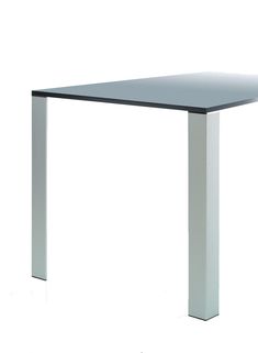 a glass and metal table on a white background