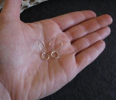 "Our dainty sterling silver minimalist ring earrings are nice and small as well as very lightweight. For days when you just want a touch of shine, throw these on with a pair of jeans. All of our jewelry will arrived boxed and ready to give as a gift. Total length: 1\" Ring diameter: 10mm Available in sterling silver and 14k gold filled Pictured in polished sterling and antiqued sterling Made to order. Allow up to 14 business days for fabrication before shipment. VISIT OUR SHOP: http://www.Poseid Delicate Hammered Sterling Silver Jewelry, Dainty Silver Hoop Earrings In 14k Gold Filled, Dainty Silver Hoop Earrings, 14k Gold Filled, Dainty Silver 14k Gold-filled Hoop Earrings, Dainty Drop Earrings With Simple Design, Dainty Silver 14k Gold Filled Hoop Earrings, Dainty Adjustable Hammered Earrings, Simple Hammered Sterling Silver Jewelry, Dainty Small Hoop Hammered Earrings