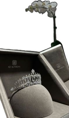 a diamond tiara in an open box on display with the word'aida al jafarada '