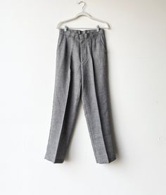 A pair of 1990s grey suit pants. Straight leg- mid rise. Zipper and latch button closure at waist. Brand is colter Waist 28 rise12 hips inseam 28 outer39.5 Gray High-waisted Pants With Belt Loops, Tailored Gray Straight Leg Pants, Gray Tailored Straight Leg Pants, Gray Bottoms With Button Closure For Spring, Gray Flat Front Pants For Business Casual, Gray Bottoms With Button Closure For Work, Classic High Waist Gray Bottoms, Gray Straight Pants With Belt Loops, Gray High Waist Pants For Formal Occasion