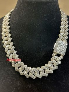 Men's Miami Cuban Link Chain Necklace Cuban Chain, Iced Necklace, CZ Diamond Choker SIlver iced Cuban Chain Mens Chain Personalize:Yes ✥ O T H E R ∙ I N F O R M A T I O N ✥ ♦ Due to every item in our shop is made to order we are open for moderate customization on demand. Contact us prior to the order. ♦ Your item will be nicely packed to gift in elegant jewelry boxes. ♦ The jewelry Certificate will be sent separately if demanded prior to the order. Contact us for more details. ✥ T U R N ∙ A R O U N D ∙ T I M E ✥ ♦ Our turnaround time is about 6 days for the given design and finish or from 7 to 10 business days for custom-made designs. This can change during peak seasons. ✥ If you can't find the information you need or need some advice for your design, feel free to contact us. We are eagerl Iced White Gold Cuban Link Jewelry, Silver Cuban Link Iced Jewelry, White Iced Out Chain Link Jewelry, Iced Out White Chain Link Jewelry, Elegant Iced Cuban Link Jewelry, Iced Out Crystal Chain Link Jewelry, Silver Cuban Link Necklace With Bling, Silver Cuban Link Necklace Iced Out With Cubic Zirconia, Silver Cuban Link Necklace With Iced Out Cubic Zirconia