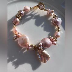 Handmade Freshwater Edison Baroque Pearl Bracelet Pink Gold Green Purple Flower Patel Pearl Gold Plated Beautiful Hardwares Baroque Pearl Bracelets For Wedding, Baroque Pearl Wedding Bracelets, Elegant Adjustable Pink Bracelet, Luxury Pink Bracelets For Wedding, Feminine Rose Gold Bracelets For Party, Feminine Rose Gold Party Bracelets, Luxury Pink Wedding Bracelets, Pink Pearl Bracelet With Round Beads For Parties, Handmade Pink Pearl Bracelet