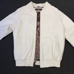 Kashani White Lambskin MA-1 Bomber Jacket - Dudes Boutique White Padded Collar Outerwear For Work, White Outerwear With Padded Collar For Work, White Stand Collar Outerwear For Formal Occasions, White Stand Collar Outerwear For Formal Events, White Fitted Outerwear With Stand Collar, Formal White Stand Collar Outerwear, Fitted Cream Leather Outerwear, White Leather Long Sleeve Outerwear, Luxury Outerwear With Stand Collar