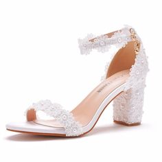 PRICES MAY VARY. Heel Height : Two style: 7.5cm /3 inches and 9cm /3.6inches Handmade: All of them handmade ,Us import Glues Stick Pearls and Lace Flowers on Shoes ,Make the shoes very Elegant and Beautiful. Occasion: Pearls fashion lady Heel Dress Pump suit for Bride, Bridesmaids and Women in any outfit for casual, Wedding,party, work, date, wedding, cocktail, nightclub, homecoming or other special occasions. COMFORT IN EVERY STEP: A soft padded foot bed keeps you comfortable and at ease no mat Pearl Heels, Queen Wedding, Bride Elegant, Ankle Strap Chunky Heels, Shoes Bride, Bow Fashion, Lace Sandals, Wedding Shoes Bride, Elegant High Heels