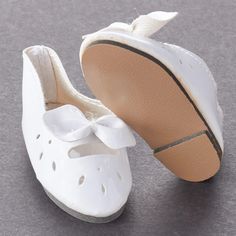 Tallina's White Slip On Baby Doll Shoes. Complete your doll's ensemble with this pair of Tallina's White Slip On Baby Doll Shoes! Not just for dolls, even use them for sweet baby shower decorations.    We purchased an entire warehouse of doll supplies. These brand new and never used items are still in their original packaging. The shoes have amazing detail that is no longer being made.    What size shoes will fit my doll?  Just like people, dolls have different sized feet. Using a cloth measurin Baby Doll Shoes, White Slip, Doll Shoes, Shower Decorations, Baby Doll, Baby Shower Decorations, Baby Dolls, Stockings, Slip On