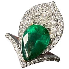 3.73 Carat Pear Shape Emerald and Diamond Cocktail Ring Luxury Pear-shaped Diamond Emerald Ring, Stones Rings, Diamond Cocktail Ring, Sparkly Jewelry, Colorless Diamond, Zambian Emerald, Art Nouveau Design, Diamond Cocktail Rings, Pretty Rings