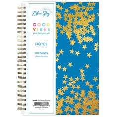 a blue and gold notebook with stars on it