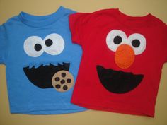 two t - shirts with faces on them, one is blue and the other is red