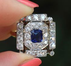 This hand made antique GIA certified unheated Cambodian Pailin sapphire and chunky monkey old cut diamonds. There are approximately 2 ctw of VS old cut diamonds set in platinum and 18k gold. The ring 17.2 x 16 mm and is currently a size 6 (but sizable) READ BELOW FOR MY SHOP'S SHIPPING/SIZING/LAYAWAY/RETURN POLICIES AND PROCEDURES: All items are shipped fully insured, signature confirmation required (unless buyer requests otherwise). SIZING: Sizing services are offered for an additional $65. If Pailin, European Cut Diamond Ring, Chunky Monkey, Old Mine Cut Diamond, Wedding Watch, No Heat, European Cut Diamonds, Diamond Sizes, Rings Statement