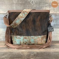 🚨ANOTHER RESTOCK! 🚨 ⚠️NEW Messengers online! 👇Fringe or now Fringe? Let us know, comment below! 👇 🌵Link in bio or click here -----> http://ow.ly/LVE150MFVXW . . . . . . . . . #westernpurse #westernfashion #bestwesternpurse #leathertote #leatherbag #haironhidebag #bohofashion #yellowstonefashion #texasfashion #rodeofashion #missrodeofashion #holycowcouture #hcc #leatherfashion #ofy #onlyforyou #messengerbag #leathermessengerbag #bagwithfringe #fringe