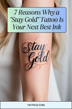 a woman's arm with the words stay gold written on it in black ink