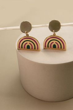 Our Pride Rainbow Drop Earrings are the perfect way to complete any look! They're bright and colorful but subtle enough for everyday wear. DIMENSION length: 1.5"width: 1" earring back: Fish Hookmetal finish: Gold Platingproduct: Lead & Nickel Compliantanti-tarnish: Double E-coating Trendy Multicolor Hypoallergenic Earrings, Modern Multicolor Earrings For Everyday, Trendy Rainbow Hypoallergenic Earrings, Multicolor Drop Earrings For Everyday, Rainbow Metal Drop Earrings, Rounded Rectangle, Sunglass Chain, Wall Accessories, Pride Rainbow