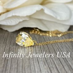 "This pendant is a pear shape yellow simulated diamond made with pure 14k yellow gold and 18\" yellow gold cable chain included item #5697 Approximate total carat weight: 2.00ctw diamond equivalent -Center Stone Size: 10x7mm -Gem Type: Simulated Diamond -Center Stone Shape: Pear Shape -Center Stone Color: Yellow -Center Stone Clarity: VVS1 -Metal Type and Purity: 14k Yellow Gold -Chain: 18\" delicate 14k gold chain / heavier option with lobster claw available (use dropdown to select) -Country of Gold Pear Shaped Diamond Solitaire Necklace, Gold Pear-shaped Diamond Solitaire Necklace, Pear-shaped Diamond Solitaire Necklace In Gold, Gold Solitaire Necklace With Brilliant Cut Teardrop Pendant, Gold Teardrop Pendant Solitaire Necklace With Brilliant Cut, Gold Brilliant Cut Teardrop Pendant Necklace, Gold Drop Necklace For Anniversary, Fine Jewelry, Formal Yellow Teardrop Pendant Jewelry, Gold Teardrop Pendant Solitaire Necklace For Anniversary