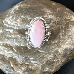 ad eBay - Find many great new & used options and get the best deals for Gorgeous Oval Pink Conch Ring Handmade USA Navajo Sz 7.5 16049 at the best online prices at eBay! Free shipping for many products! Pink Oval Opal Ring In Sterling Silver, Classic Pink Oval Cabochon Ring, Adjustable Oval Cabochon Ring With Large Stone, Artisan Sterling Silver Oval Rings, Large Oval Moonstone Ring, Pink Oval Ring With Large Stone, Oval Silver Western Jewelry, Oval Pink Ring With Large Stone, Adjustable Oval Cabochon Opal Ring