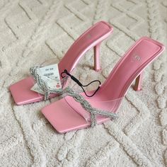 Rhinestone Vinyl High Heel Sandals Vinyl High Heel Slide Sandals. Woven Rhinestone Straps. Squared Toe. Heel Height: 3.7 Inches (9.5 Cm) Share Shopping Bag (19) Rhinestone Vinyl High Heel Sandals View Similarout Of Stock Vinyl High Heel Slide Sandals. Woven Rhinestone Straps. Squared Toe. Heel Height: 3.7 Inches (9.5 Cm) Airfit. Flexible Technical Sole Made Of Latex Foam Designed To Offer Increased Comfort. See More Pink | 1324/010 Composition & Care Composition We Work With Monitoring Programs Trendy Rhinestone Evening Sandals, Bedazzled Sandals For Spring Party, Chic Bling Sandals For Summer, Chic Summer Sandals With Bling, Chic Pink Sandals With Rhinestones, Rhinestone Sandals For Summer Cocktail Events, Summer Cocktail Sandals With Rhinestones, Zara Silver Heels With Rhinestones, Spring Silver Bedazzled Sandals